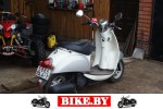 Honda Scoopy photo 2